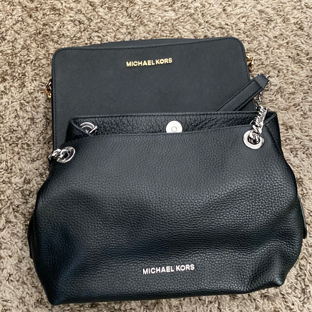 2 black Michael Kors purses